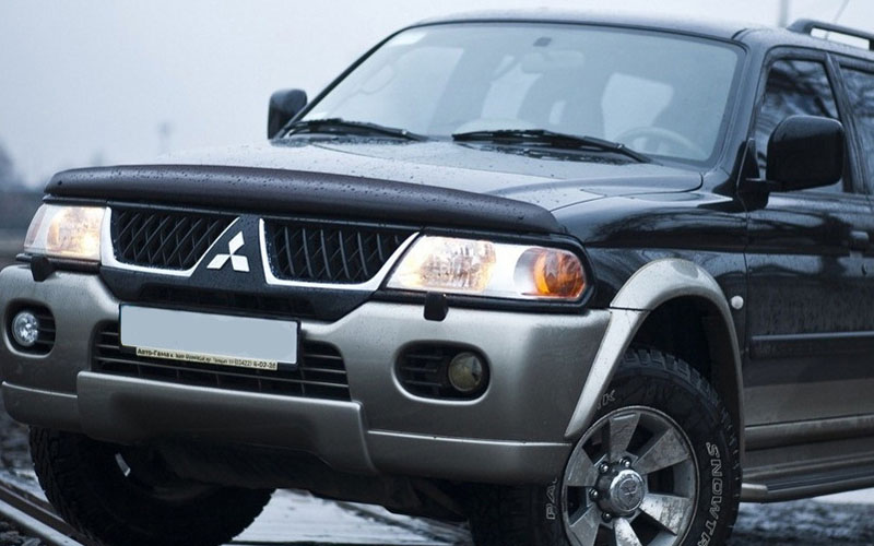 Дефлектор капота Mitsubishi Pajero Sport '1996-2008 (без логотипа) Sim